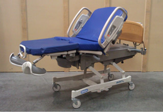 A hospital bed on wheels.